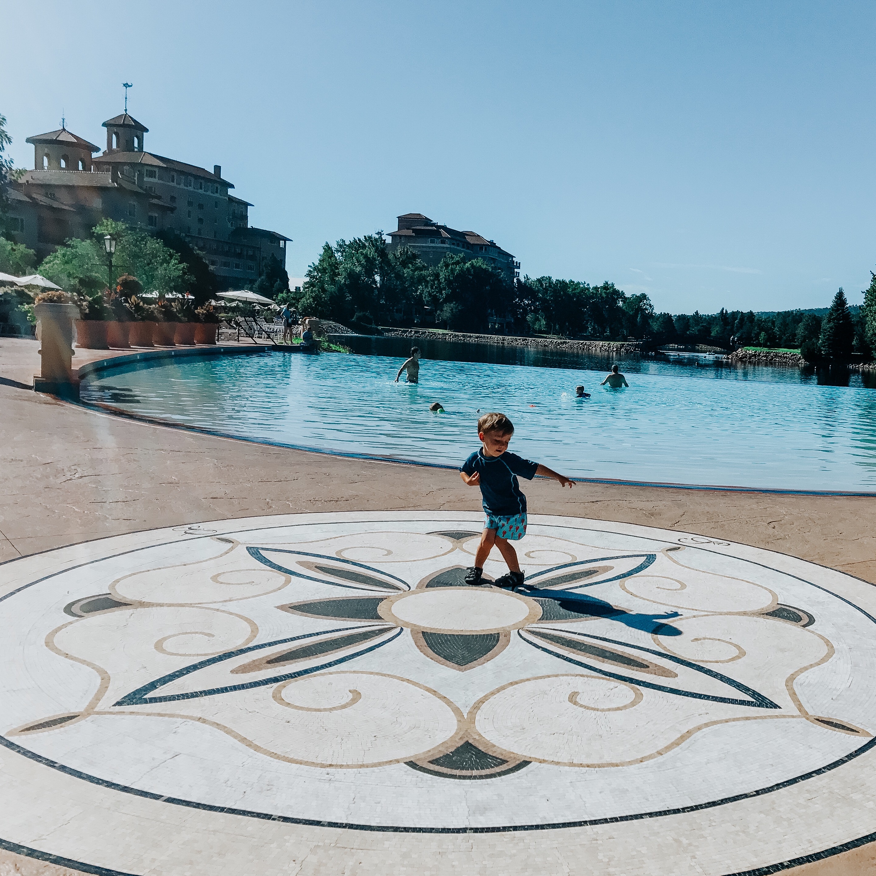 toddler at pool